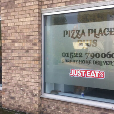 Window graphics and signs